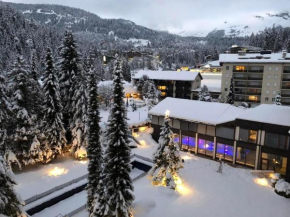 Laax 1 12 Zi Whg mit Hallenbad, Aussen- Pool, Tennisplatz und Sauna